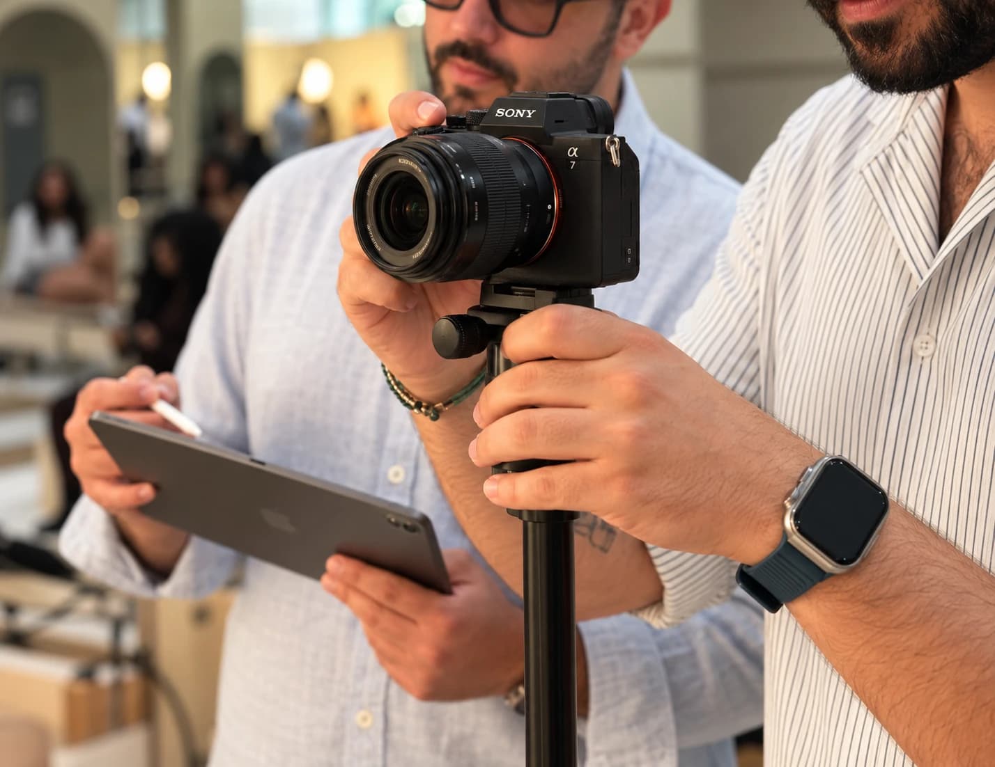 WebRise camera operator filming on location with a Sony camera