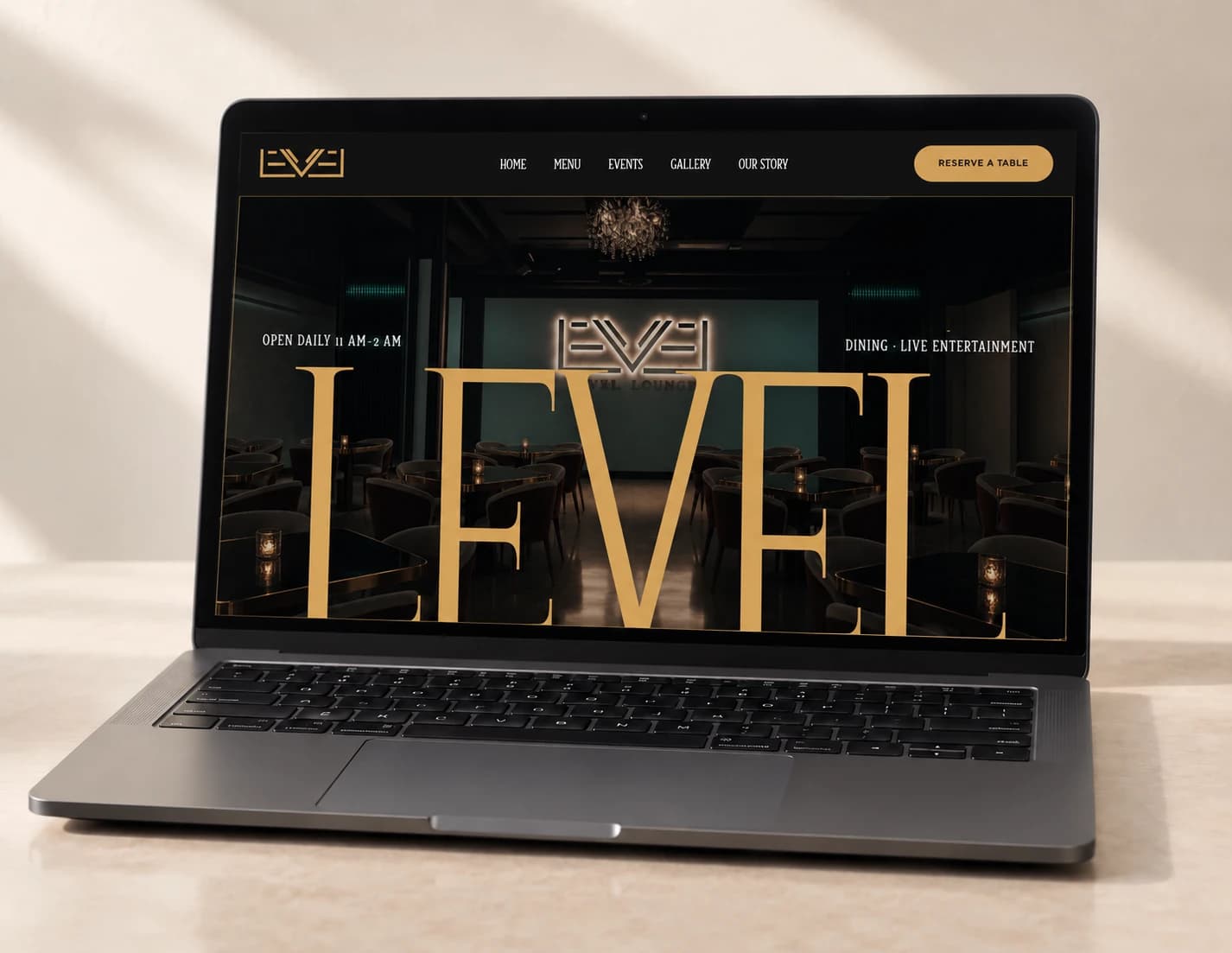 Laptop mockup displaying the Level Lounge website