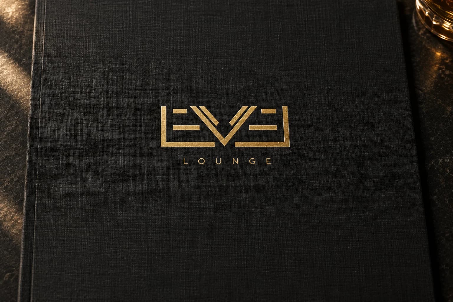 Level Lounge portfolio artwork with a gold wordmark on charcoal linen